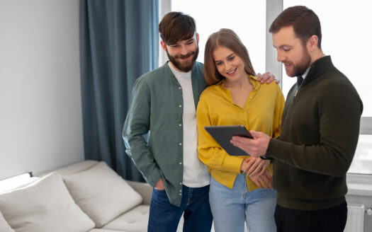 one couple taking guidance on how to rent an apartment for the first time from a broker